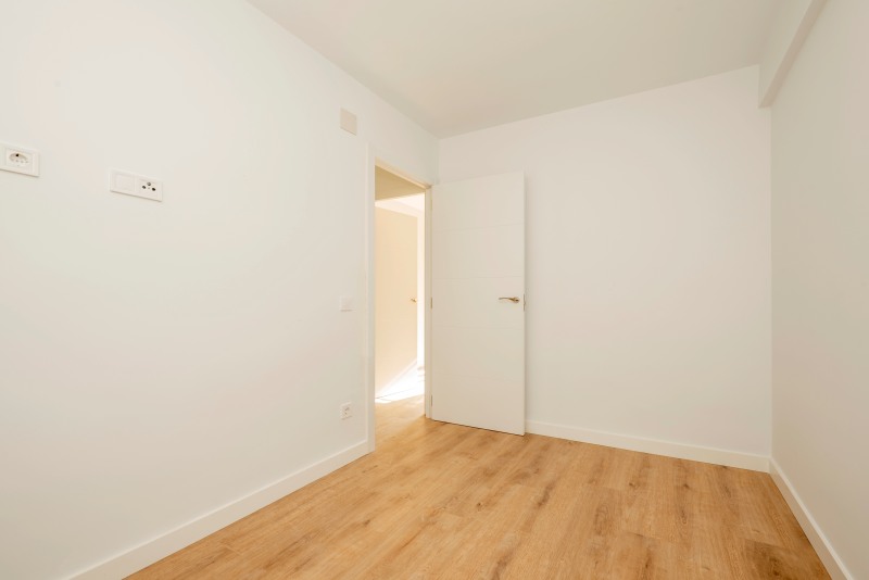 The Difference Professional Interior Painting Makes Empty Living Room Chestnut Wood Floors Freshly Painted Walls Drape Tec