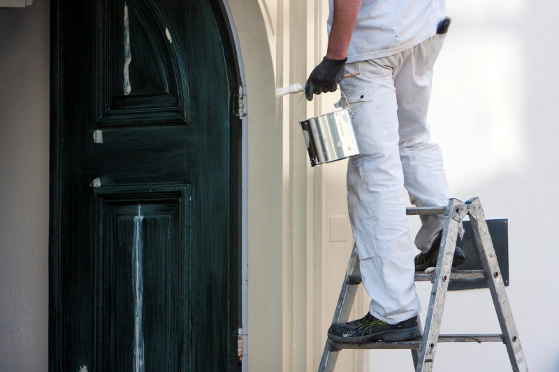 House painter on a ladder